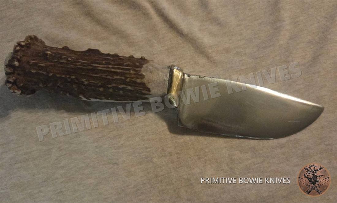 Dark stag knife with brass guard, a handmade elk stag knife that has been sold